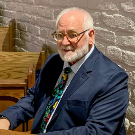 photo of Rick Schlosser sitting at the organ